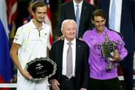 Daniil Medvedev (L) with the US Open runner-up trophy